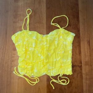 Isabelle’s Cabinet Yellow top